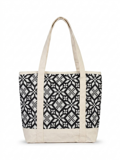Black & White Geometric Printed tapestry and canvas women tote bag with a cream-coloured canvas base.