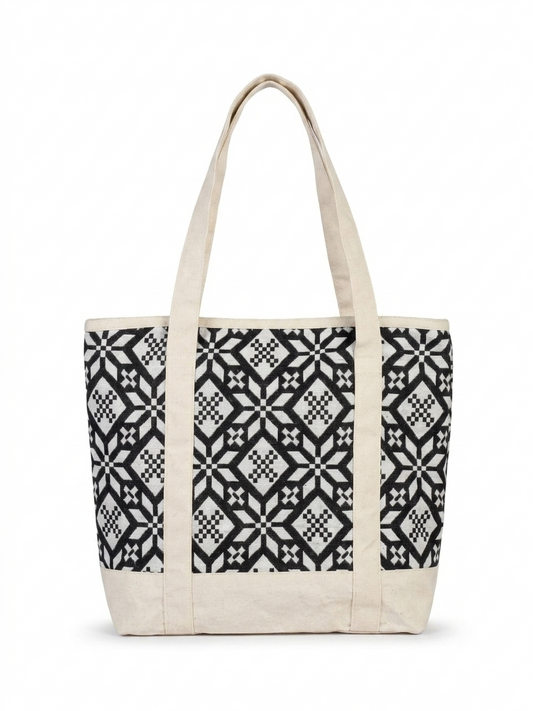 Black & White Geometric Printed tapestry and canvas women tote bag with a cream-coloured canvas base.